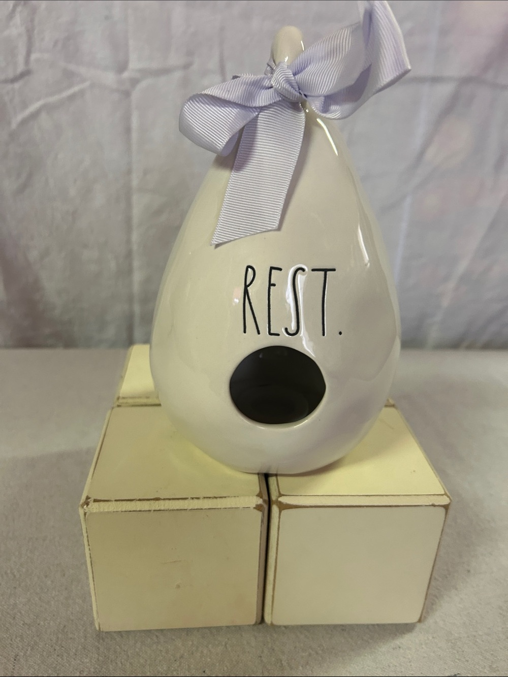 Rae Dunn White Ceramic 'REST' Accent with Lavender Bow